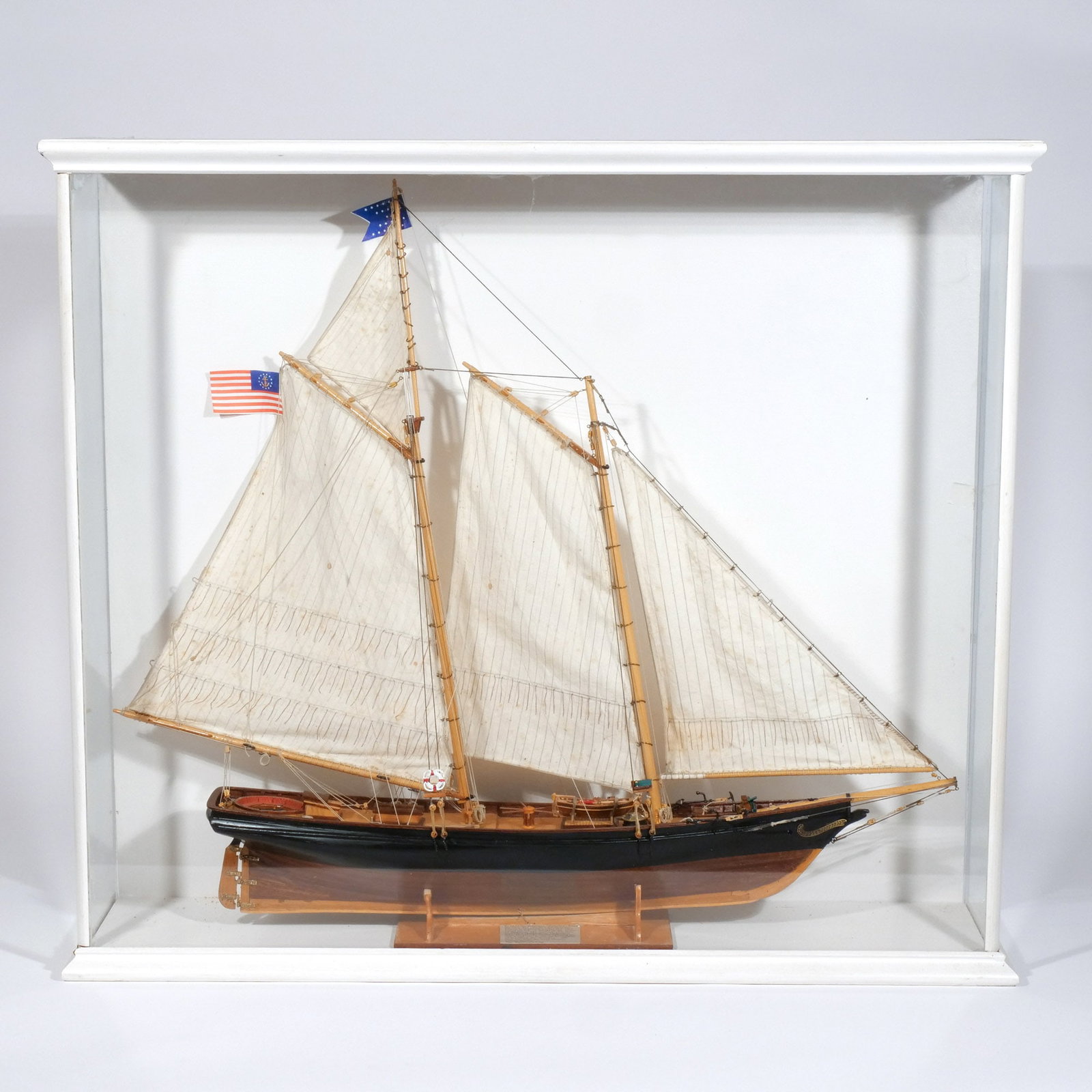 CASED MODEL of the SCHOONER 'AMERICA': 20th century h. 23 w. 27 d. 5 in. overall: 26 x 29-1/2 x 7 in. (incl. case) Provenance: Descent through a prominent Greenwich, CT doctor's estate [In Situ Item] This item will not be on display in