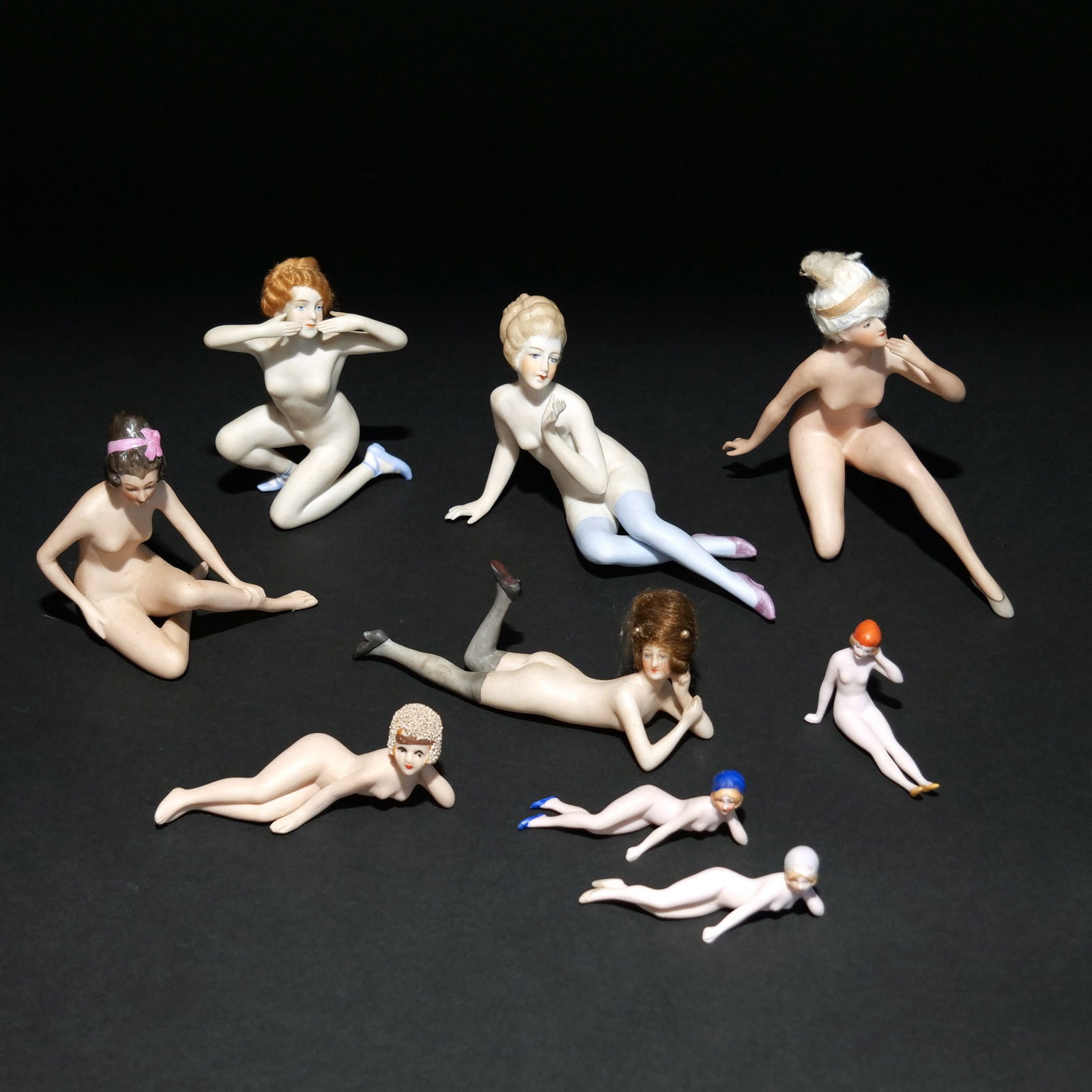 (10pc) GERMAN BISQUE BALLERINA & NUDE FIGURINES: Circa 1900-1940, some with applied hair, some with incised numbers h. 4-1/2 w. 5-1/2 d. 3 in. (largest) Provenance: Descent through a prominent Greenwich, CT doctor's estate [In Situ Item] This item