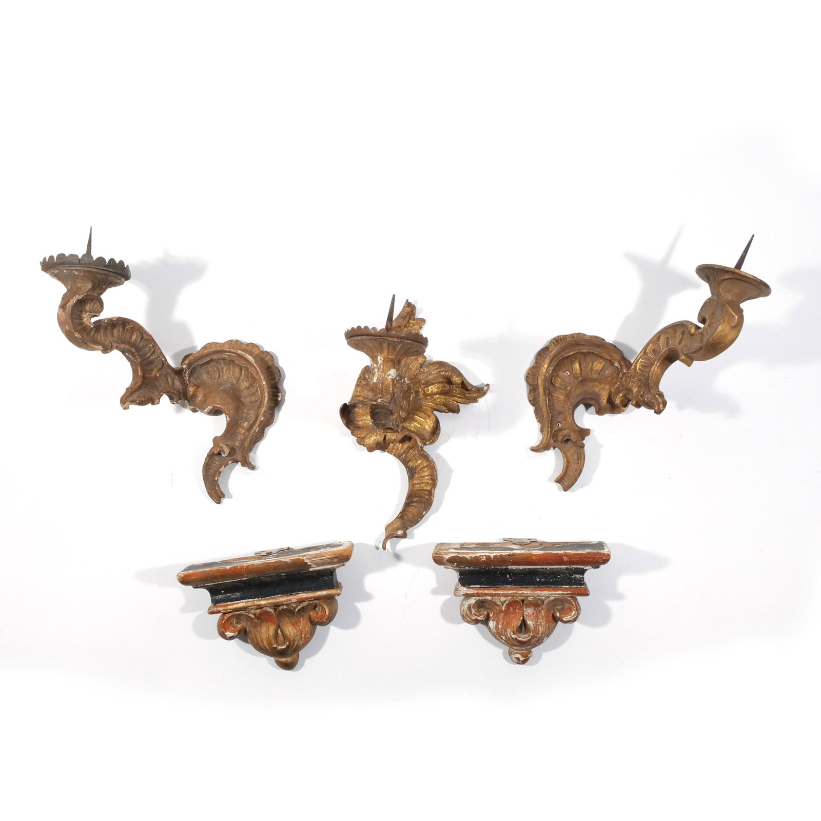 (5pc) ITALIAN GILT-CARVED SCONCES & BRACKETS: 18th/19th centuries, including a set of three rococo carved one-light pricket sconces with scroll arms and foliate backs (one facing center, the other two facing opposing directions), plus a pair of