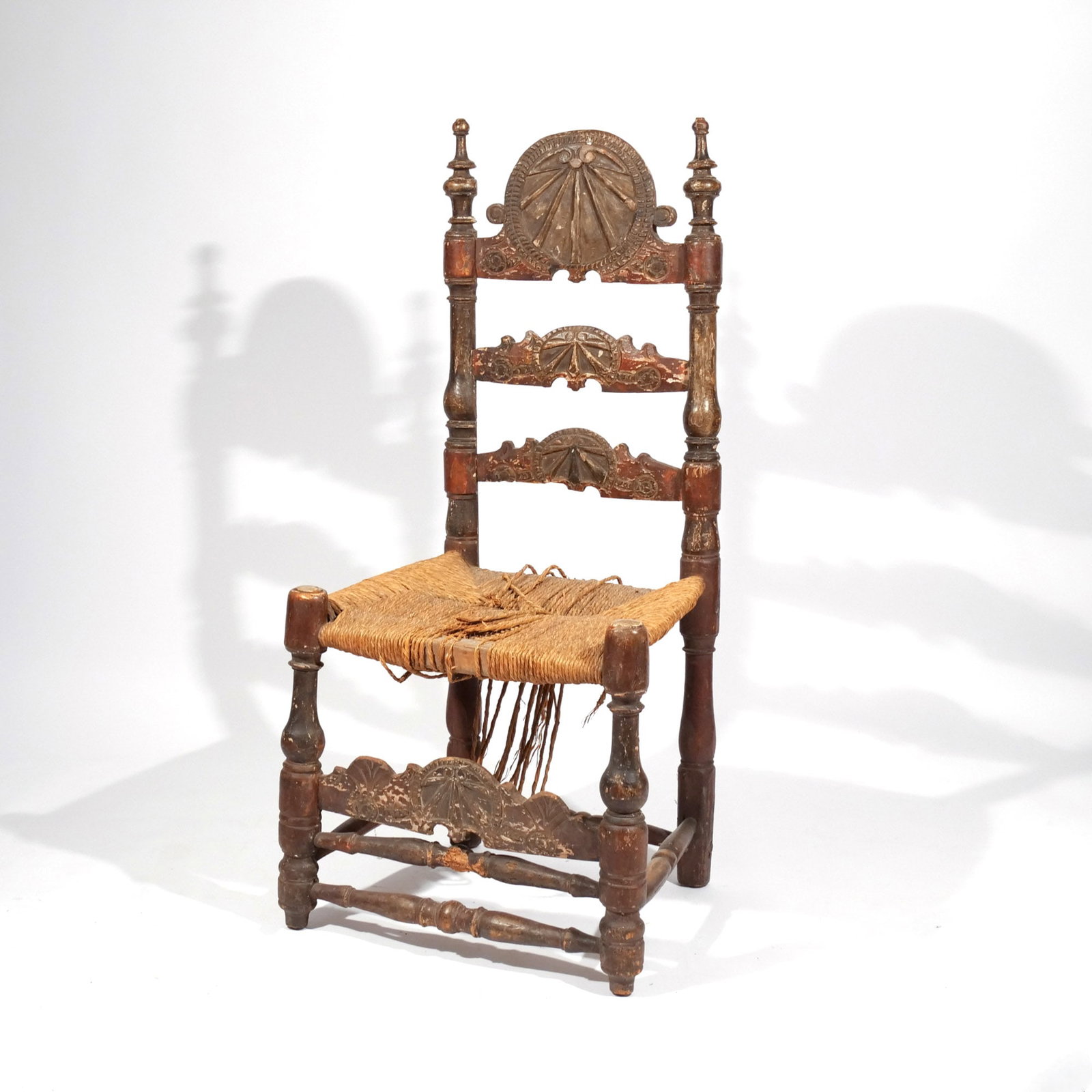 ITALIAN or SPANISH BAROQUE SIDE CHAIR: With rush seat h. 18 in. (seat height) w. 22 d. 19 in. overall: 41 x 22 x 19 in. Provenance: The estate of noted artist and author Edward Giobbi (1926-2026), Katonah, NY [In Situ Item] This item will 