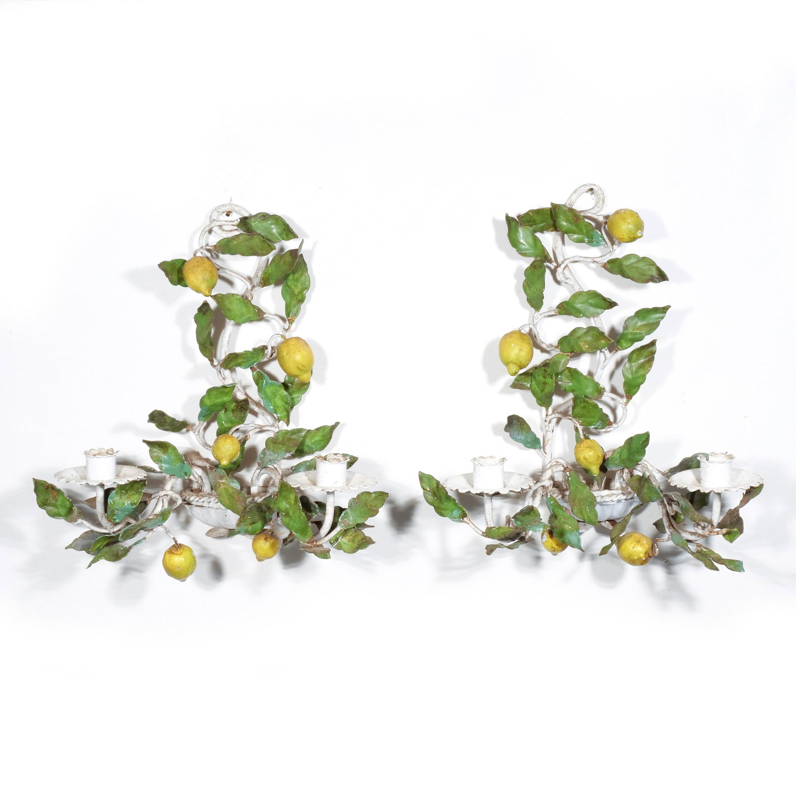 PAIR of ITALIAN TOLE DOUBLE ARM SCONCES: c. 1960s, in the form of lemon trees h. 13 w. 12 d. 7 in. Provenance: The estate of Richard and Jean M. Bergstresser, owner of the Laurence McGuire House, historic landmark, Greenwich, CT [In Situ Ite