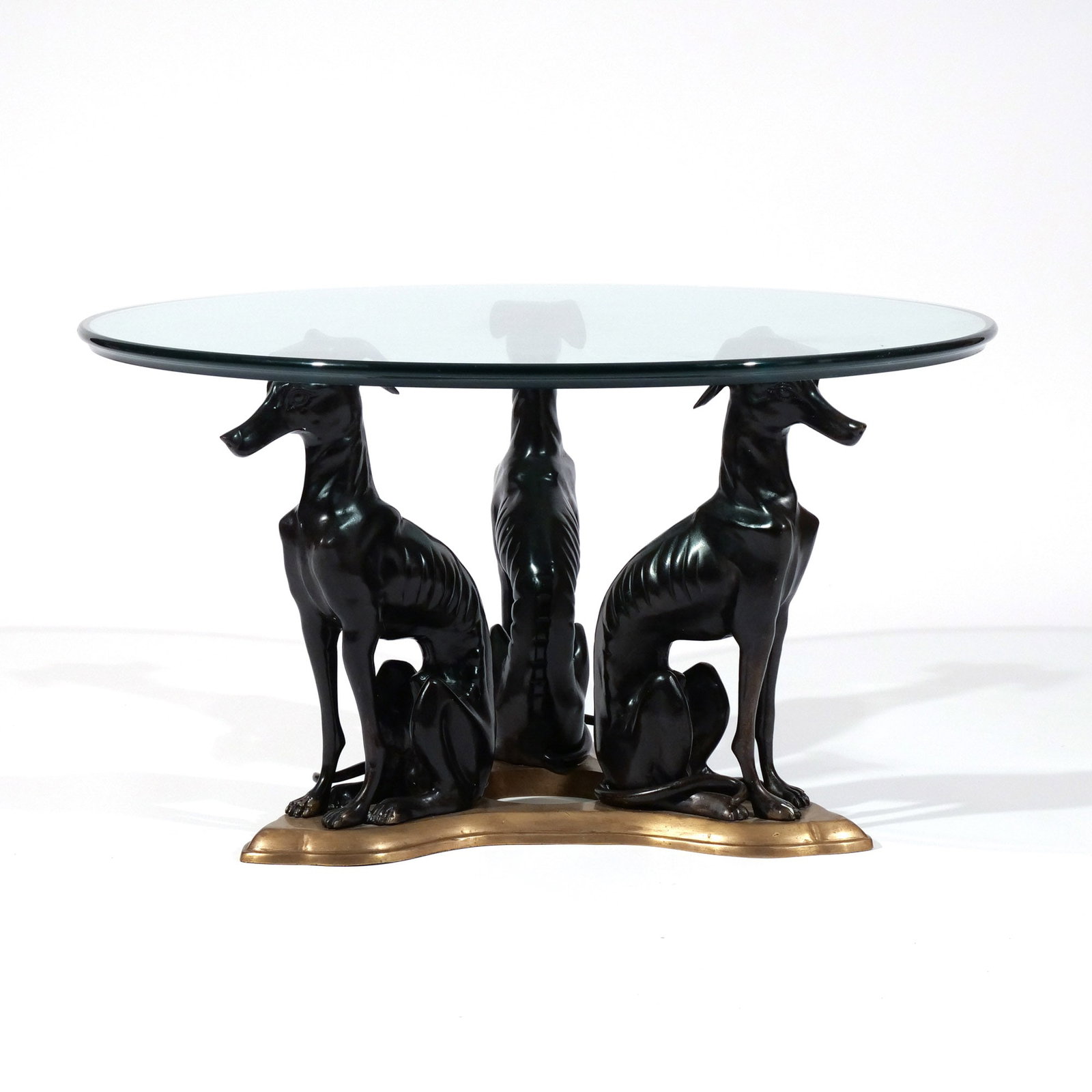 MAITLAND SMITH BRONZE 'WHIPPET' COFFEE TABLE: With circular glass top h. 16-1/2 dia. 30 in. Provenance: Private collection, Mount Kisco, NY [In Situ Item] This item will not be on display in our saleroom during our preview period. If you wish to 