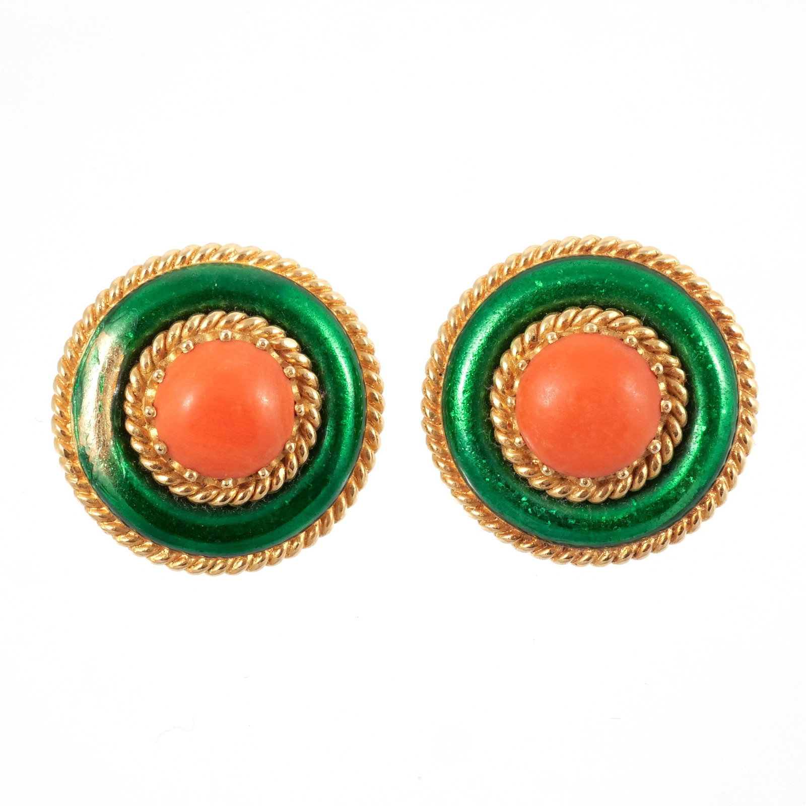 PAIR of 18K GOLD, ENAMEL, AND CORAL EAR CLIPS: Button style with roped gold surrounding round coral stones and accented by green enamel, marked '18K', 26.5 g total weight h. 1 in. Provenance: Descended through the estate of U.S. Ambassador James C