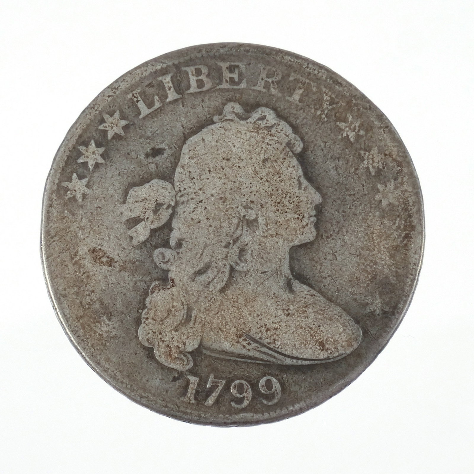 1799 DRAPED BUST $1 COIN: Well circulated, 0.8 ozt Provenance: Descended through the estate of U.S. Ambassador James C. H. Bonbright, Washington, DC