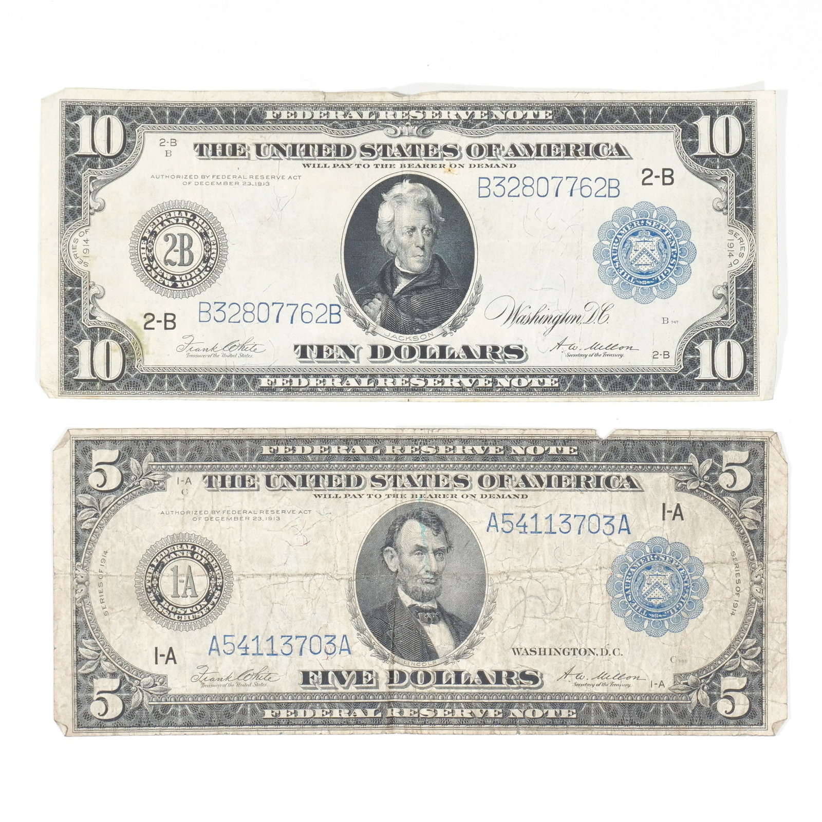 1914 $5 AND $10 BILLS: $5 note with portrait of Abraham Lincoln and Columbus in Sight of Land and the Landing of the Pilgrims to the back, $10 note with portrait of Andrew Jackson and vignettes of a farm and factory scene