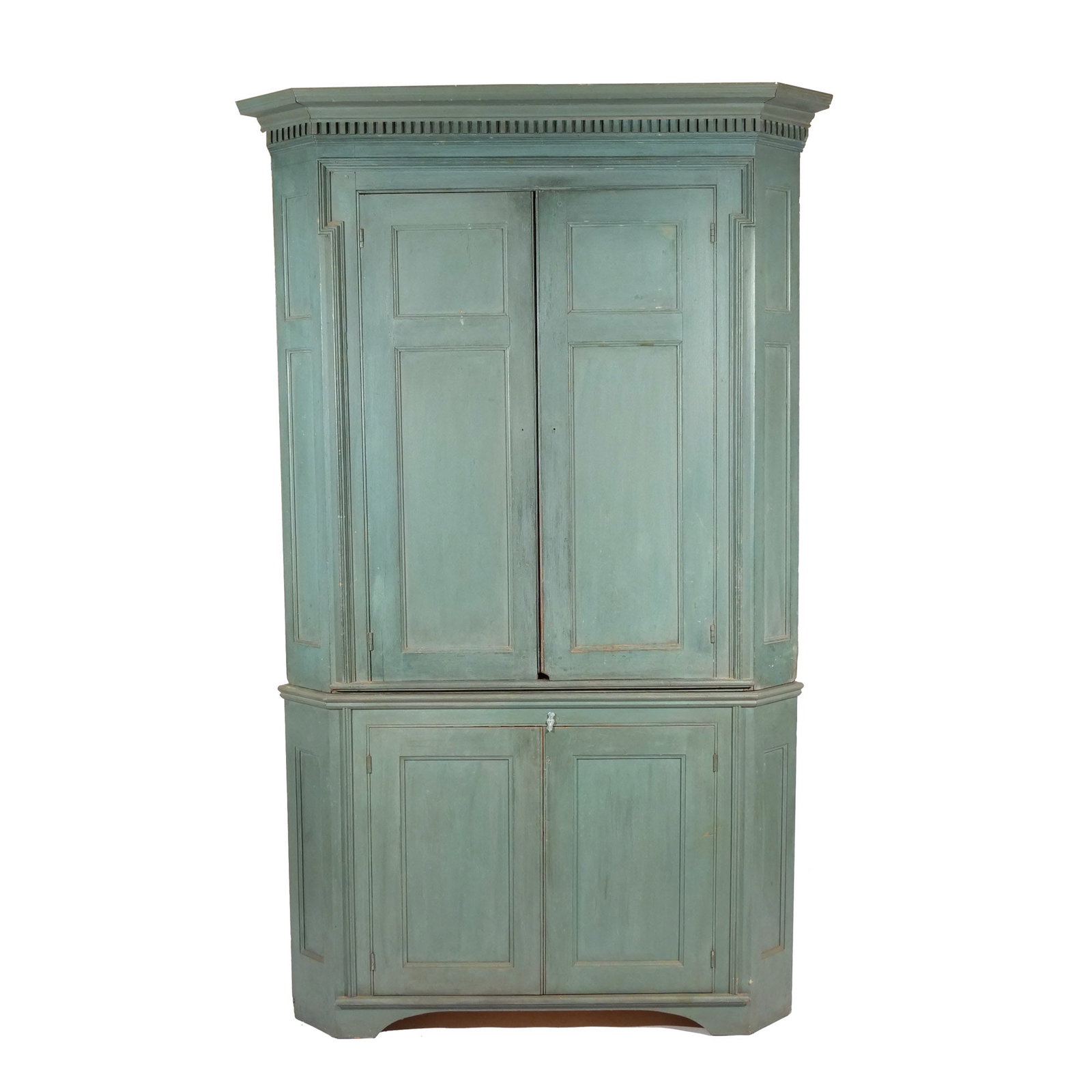 AMERICAN PAINTED BLIND FRONT CORNER CUPBOARD: 19th century, two-piece construction h. 84-1/2 w. 52 d. 26 in. Provenance: Landmark Hoyt Homestead, Pound Ridge, NY [In Situ Item] This item will not be on display in our saleroom during our preview