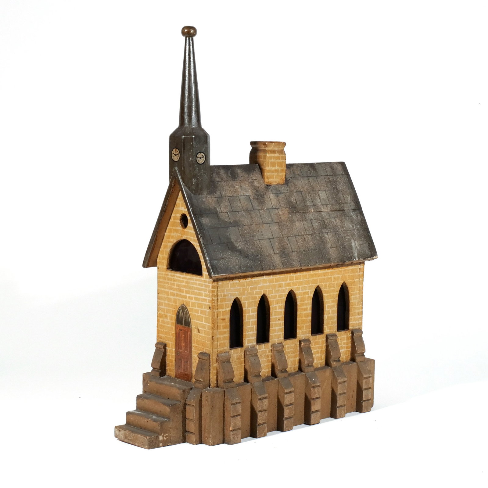 FOLK ART MODEL CHURCH: Late 19th / early 20th century, carved and painted gothic-style church with pierced window slits h. 26 w. 19 d. 9 in. Provenance: Private collection, Bernardsville, NJ [In Situ Item] This item will