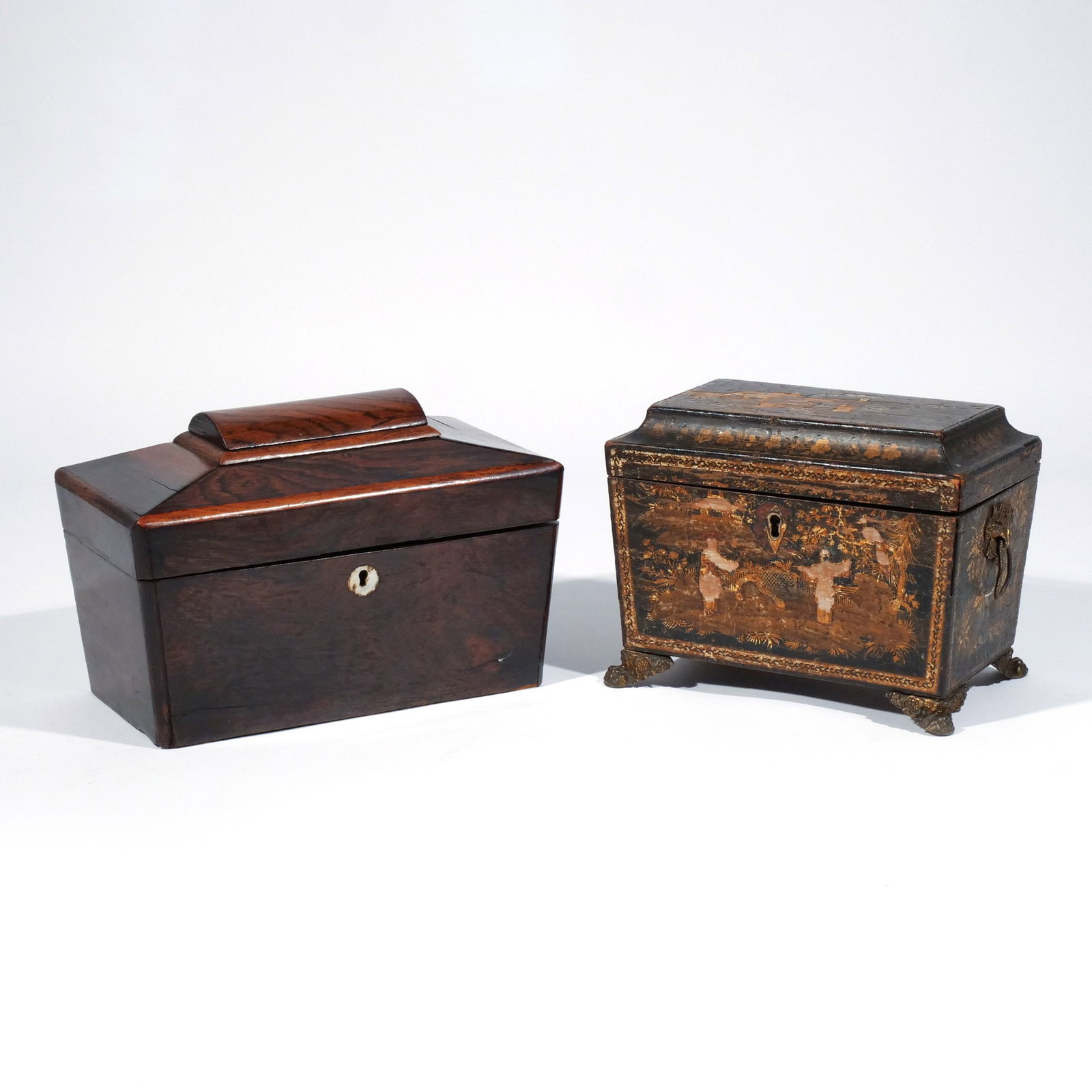 (2pc) SARCOPHAGUS FORM TEA CADDIES: 19th century, including a parcel gilt Chinoiserie tea caddy of sarcophagus form, with gilt decoration throughout; and a rosewood tea caddy also of sarcophagus form h. 6-1/2 w. 8-1/4 d. 5-1/4 in.