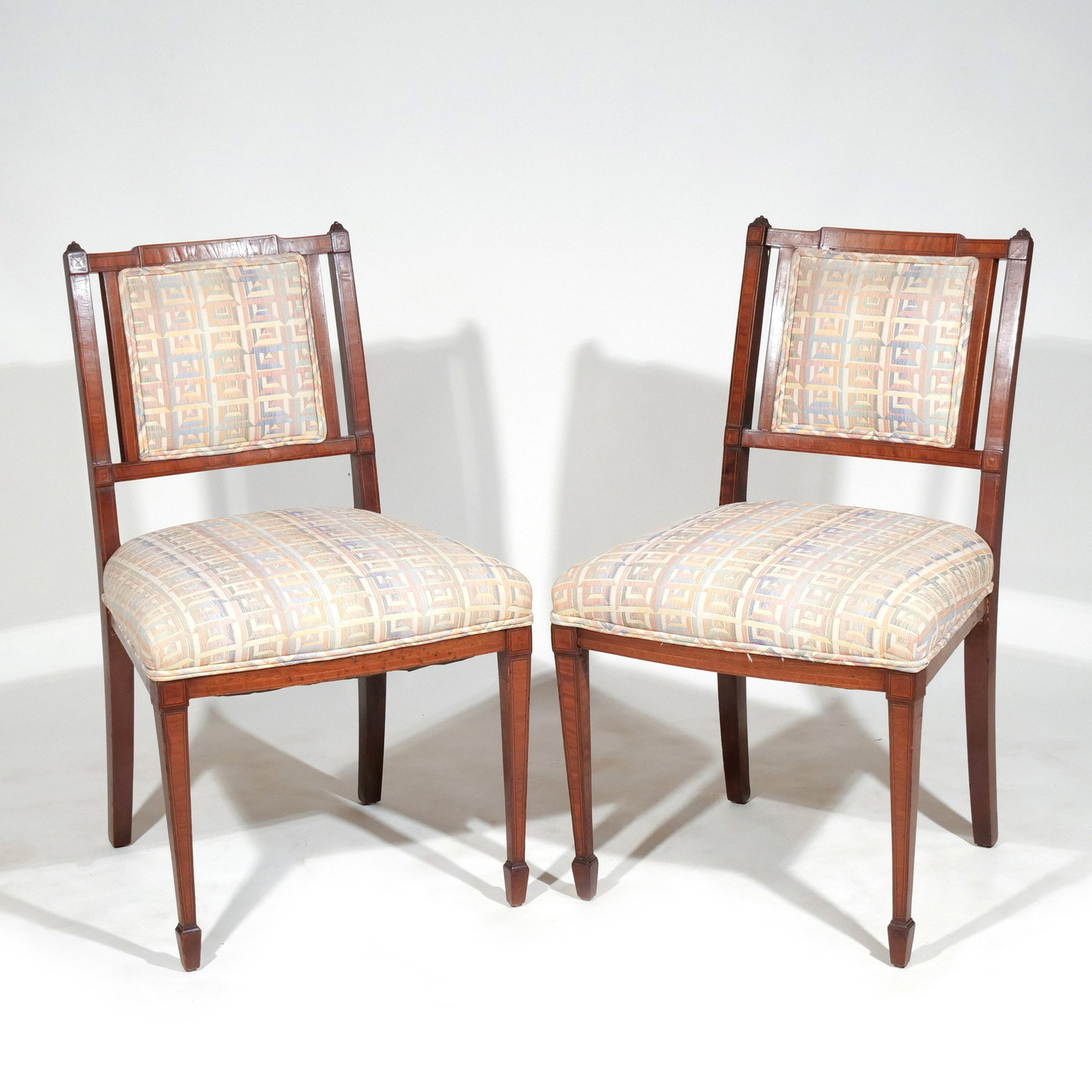 PAIR of REGENCY INLAID MAHOGANY SIDE CHAIRS: Circa 1830s, with square banded stiles, splats, and tapering legs ending in peg feet, seat height 18 in. h. 33-1/2 w. 20 d. 19 in. Provenance: Descent through a prominent Greenwich, CT family [In