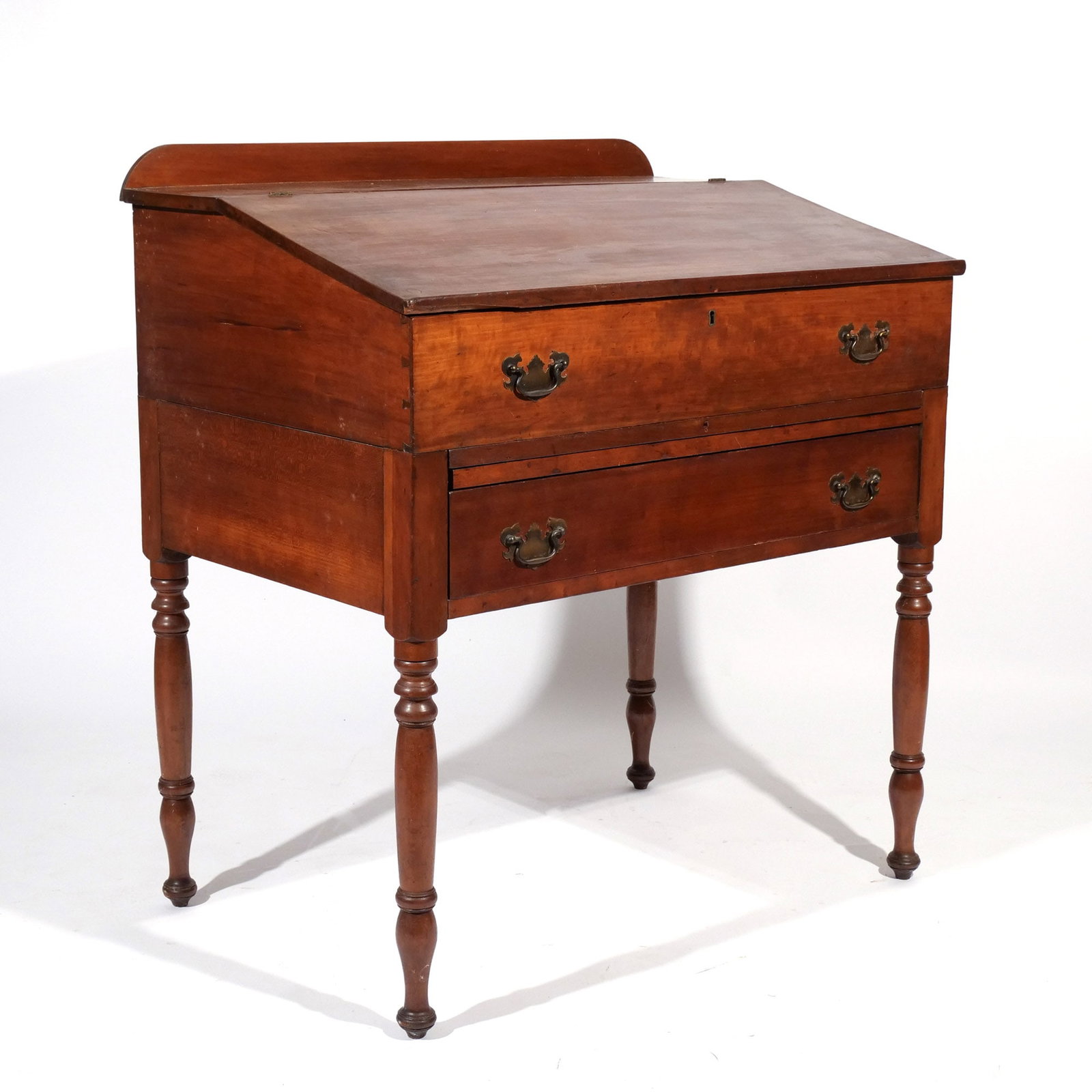 AMERICAN CHERRY & PINE SCHOOLMASTER'S DESK: 19th century, one drawer h. 40-1/2 w. 38 d. 25 in. Provenance: Descent through a prominent Greenwich, CT doctor's estate [In Situ Item] This item will not be on display in our saleroom during our