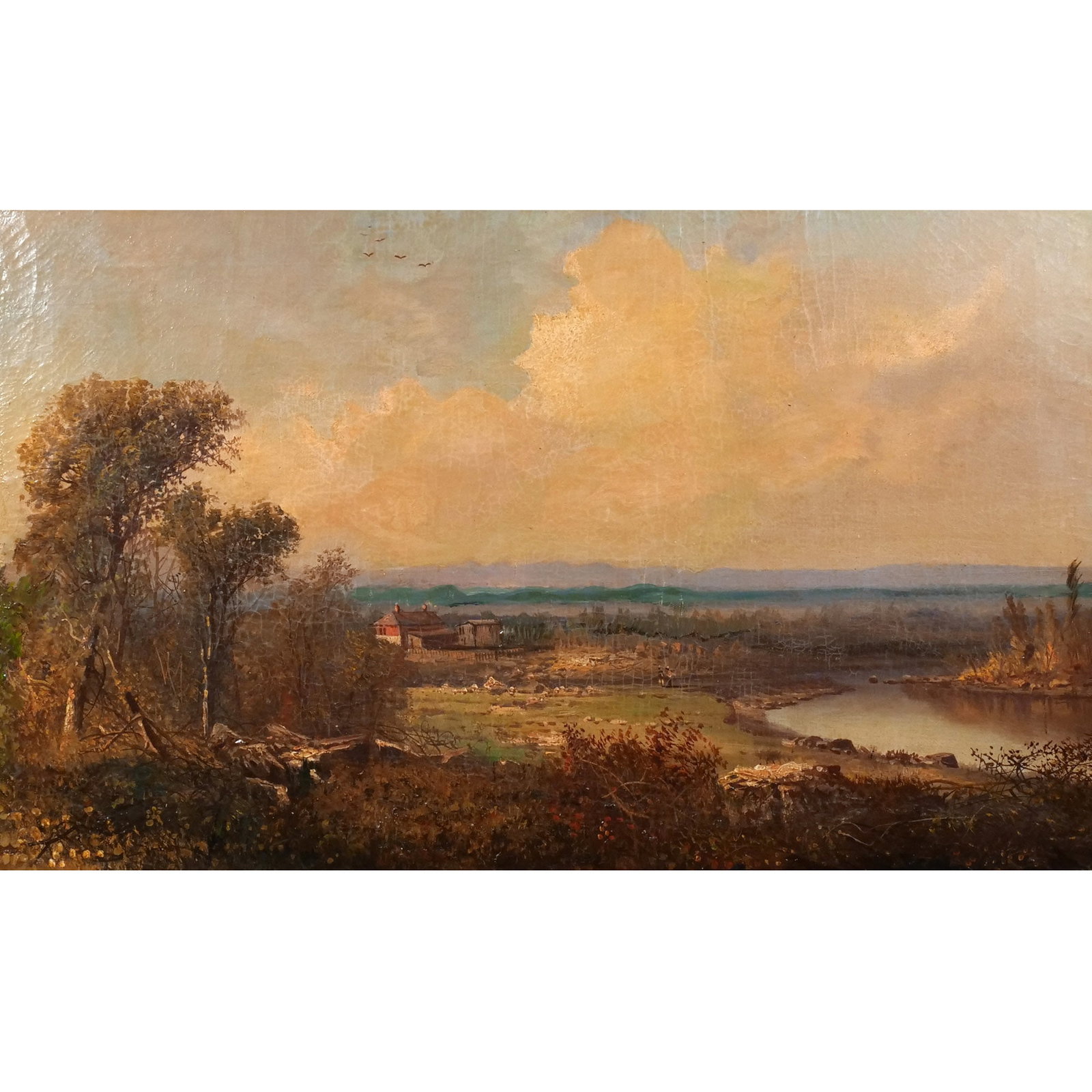AMERICAN SCHOOL LANDSCAPE, late 19th century: Landscape with river and homestead Oil on canvas h. 22 w. 36 in. No apparent signature, Artists' colourmen brand on canvas reads: From Geo. Finkenach, Artists & Painters Emporium, --- Ave., N.Y.', fra