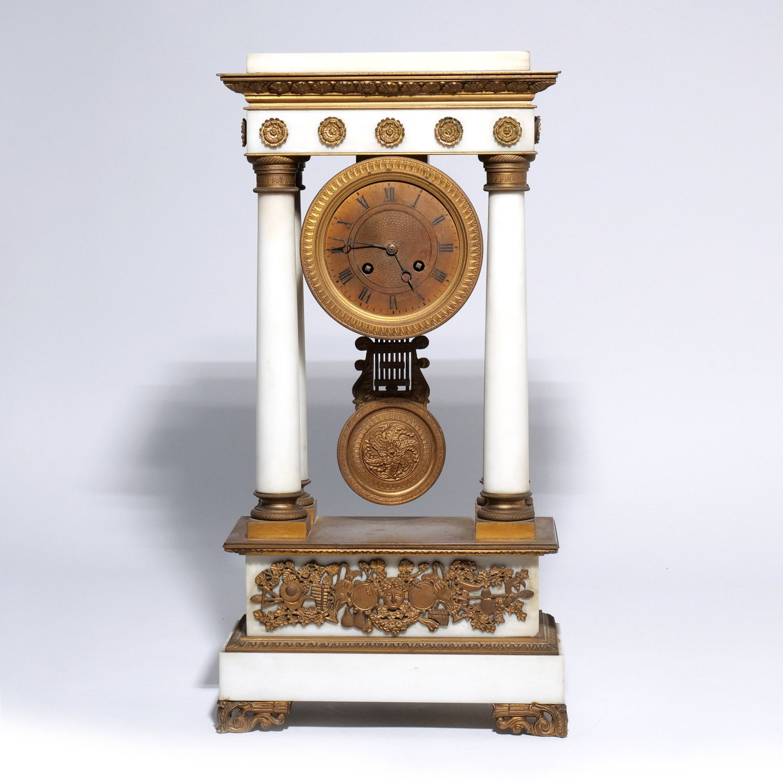 FRENCH EMPIRE ALABASTER BRONZE PORTICO CLOCK: 19th century h. 19-3/4 w. 10 d. 5 Provenance: Descent through a prominent Greenwich, CT family [In Situ Item] This item will not be on display in our saleroom during our preview period. If you wish