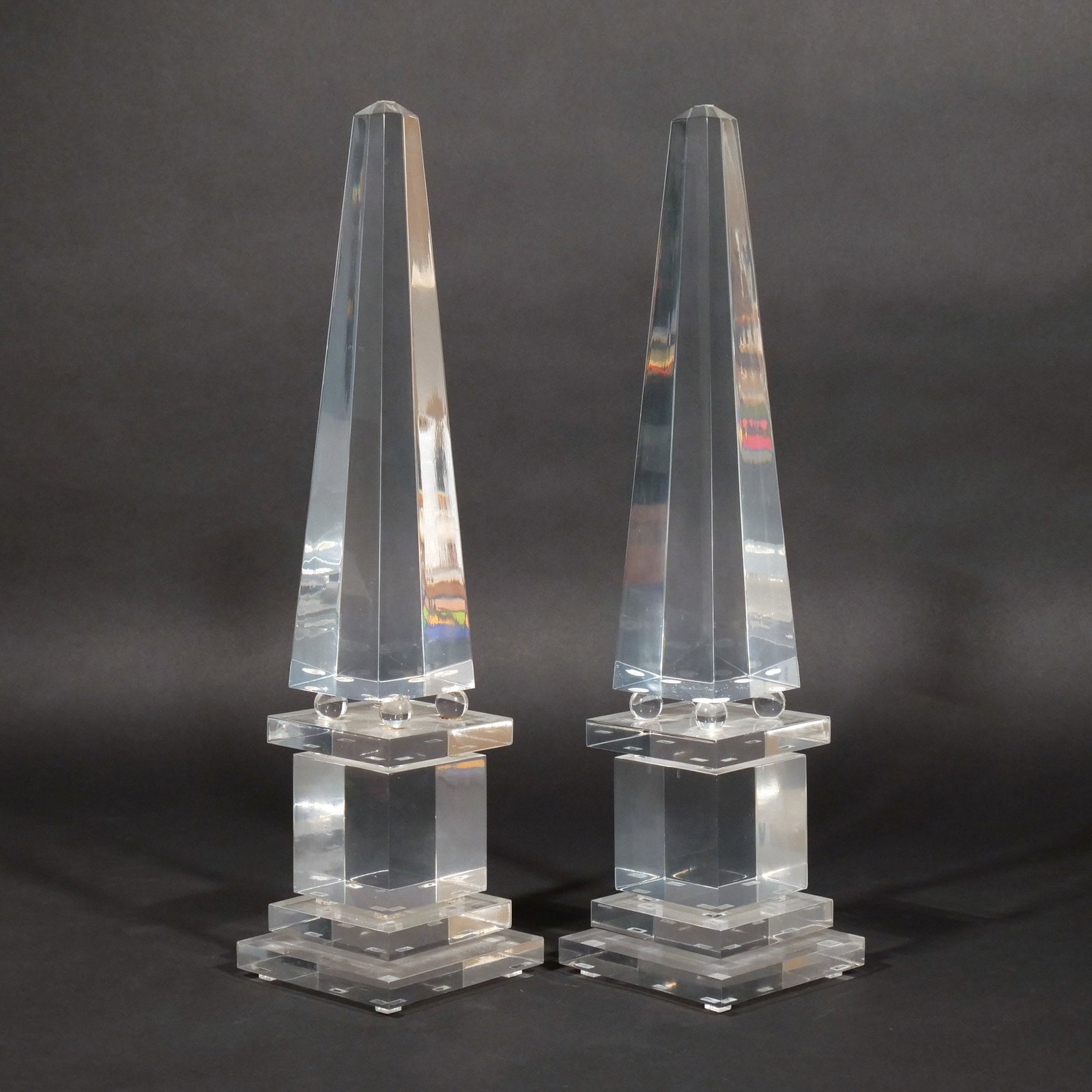 PAIR of MID-CENTURY LUCITE OBELISKS: Circa 1960s, unmarked h. 19 w. 4-3/4 Provenance: Descent through a prominent Manhattanite's estate [In Situ Item] This item will not be on display in our saleroom during our preview period. If you