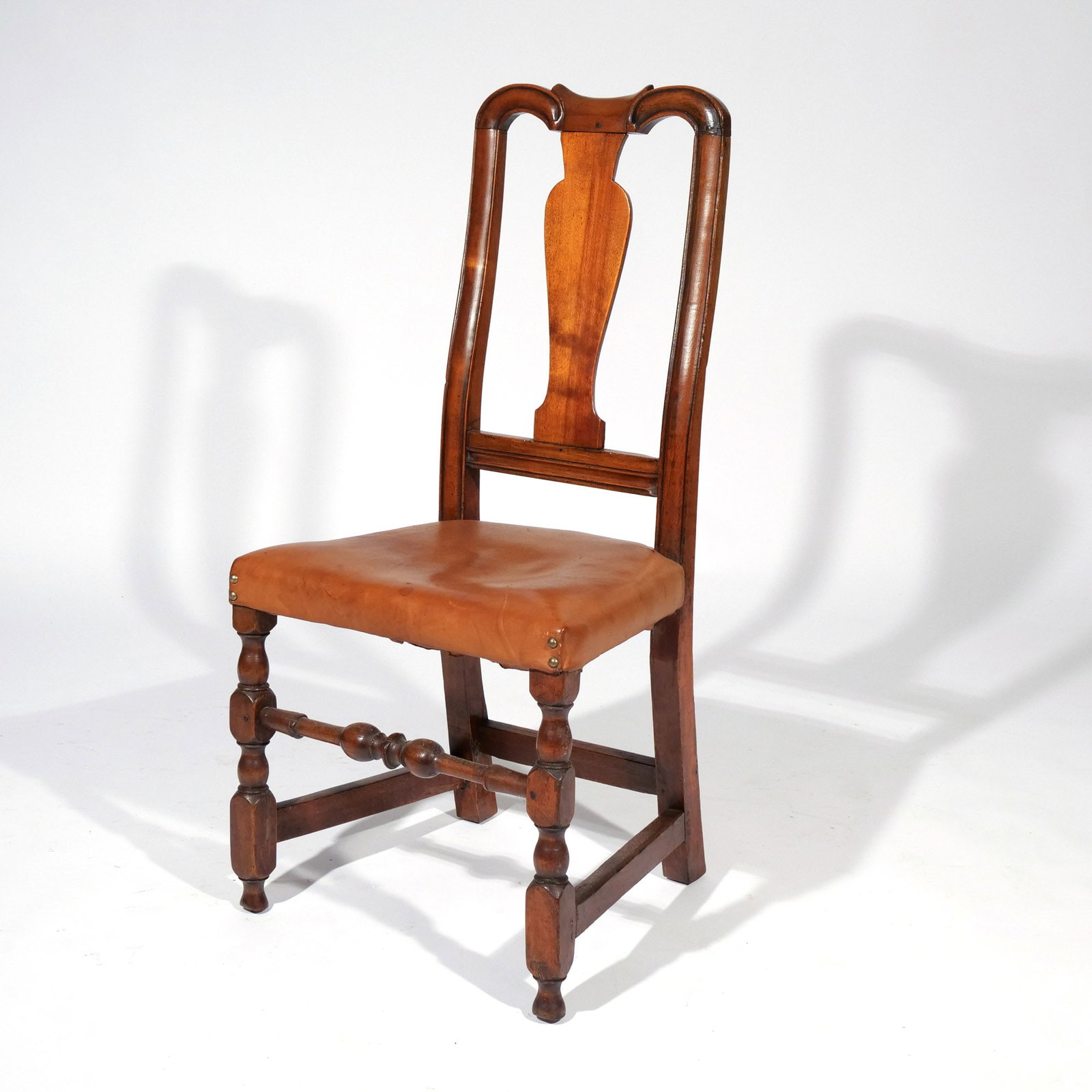 WILLIAM & MARY NEW ENGLAND MAPLE SIDE CHAIR: c. 1730-50, the yoke crest above a vase-form splat, the over upholstered trapezoidal seat, raised on block-and-bulbous turned legs joined by a frontal bulbous and ring-turned stretcher h. 16-1/2 in.
