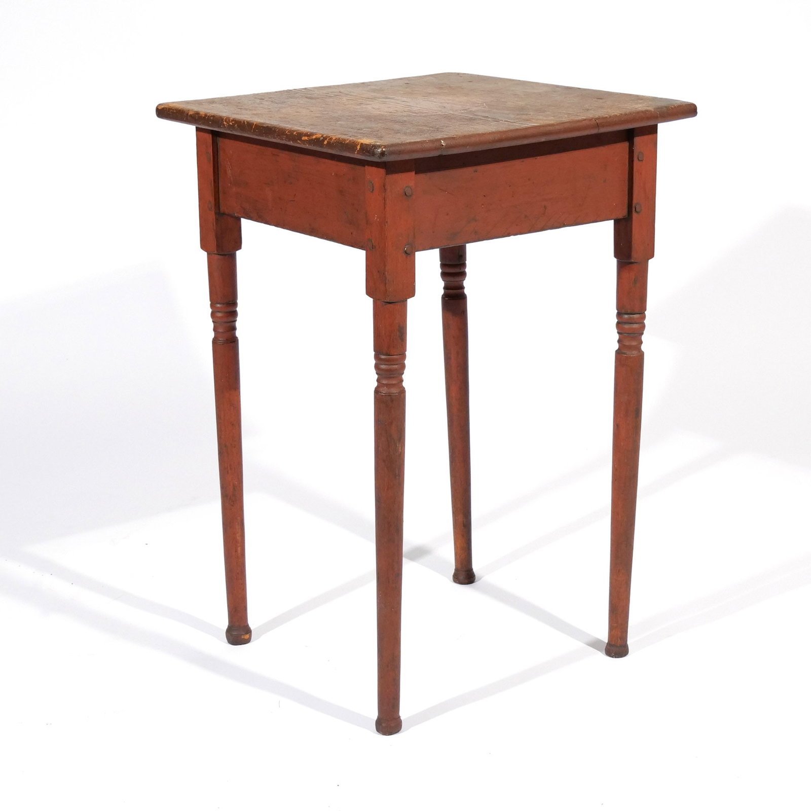 AMERICAN FOLK-ART RED-PAINTED STAND: 19th century, with scrubbed pine top and turned legs ending in ball feet h. 27-1/2 w. 18-1/2 d. 18-1/2 in. Provenance: Private collection, Bernardsville, NJ [In Situ Item] This item will not be on