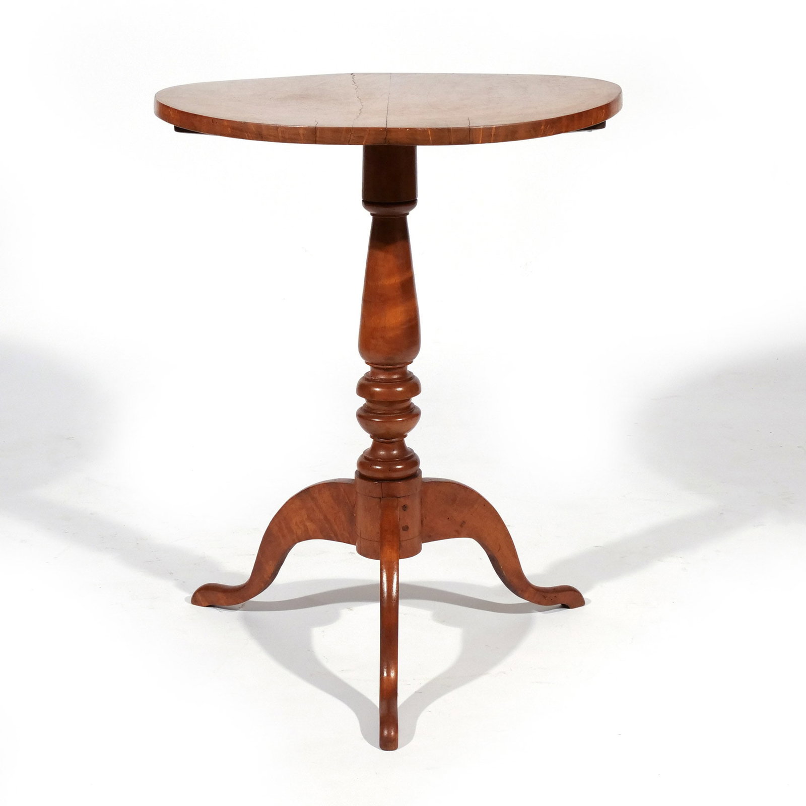 ANTIQUE TIGER MAPLE & MAPLE TEA TABLE: Two-board top h. 27-1/2 dia. 21-1/4 in. Provenance: Landmark Hoyt Homestead, Pound Ridge, NY [In Situ Item] This item will not be on display in our saleroom during our preview period. If you wish to v