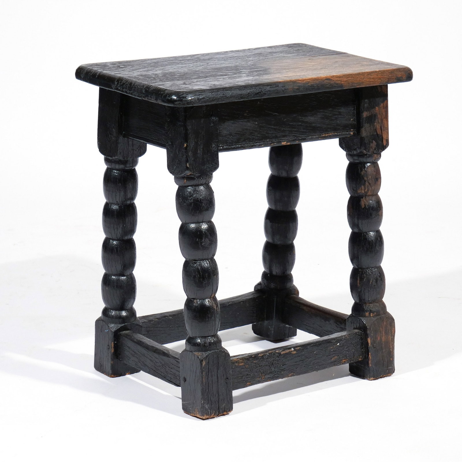 EARLY ENGLISH PAINTED OAK JOINT STOOL: 17th century, with egg-turned legs joined by box stretcher h. 19 w. 17 d. 11 in. Provenance: Landmark Hoyt Homestead, Pound Ridge, NY