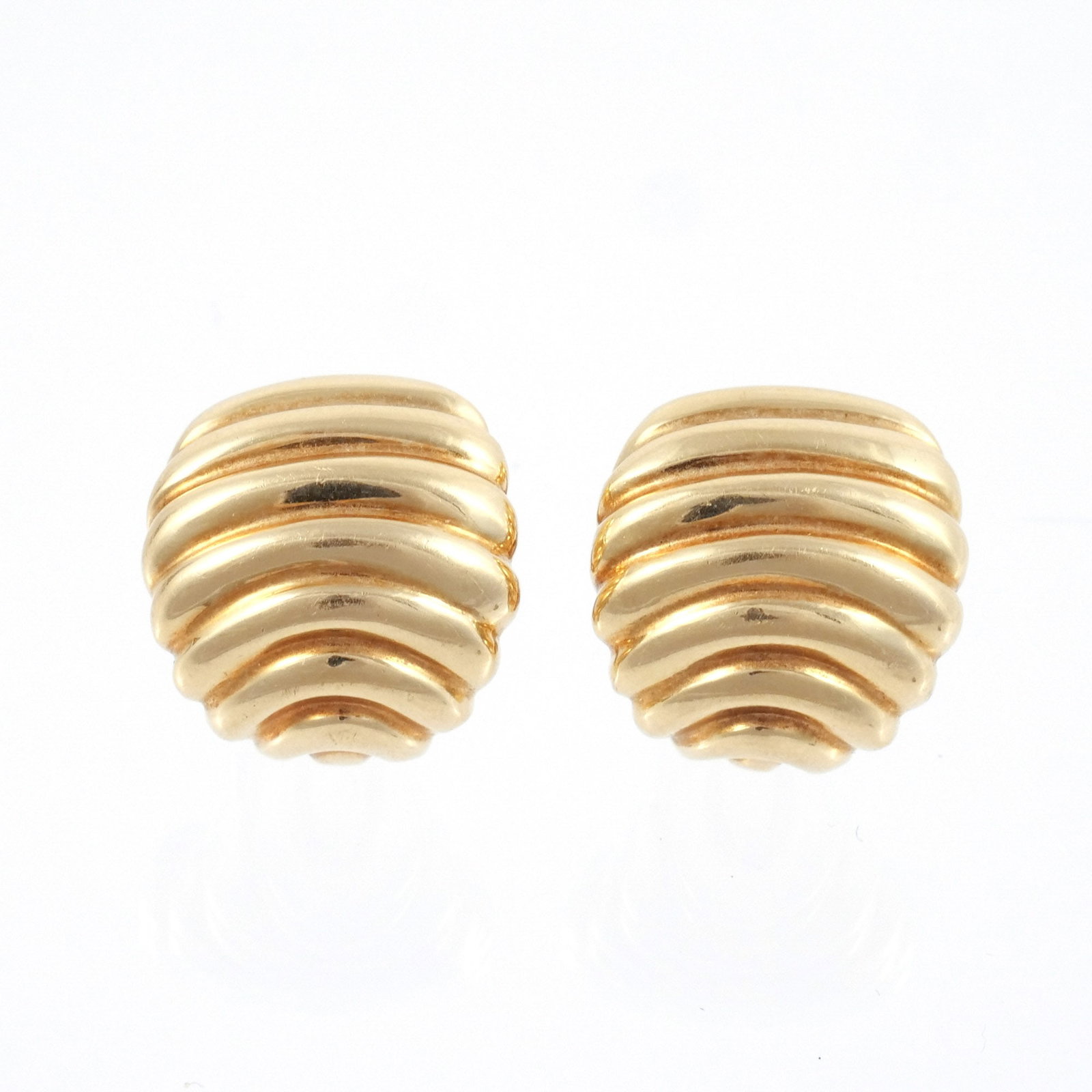PAIR of ITALIAN 18K GOLD HUGGIE EAR CLIPS: Of ribbed huggie design, marked 'Italy / 18k', 16.6 g total weight