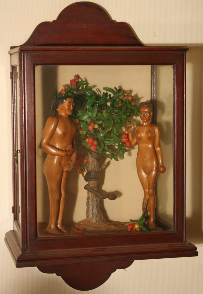 261) FOLK ART CARVED DIORAMA depicting Adam and Eve: in paradise, 20th Century, H: 21 ½" W: 11 ½" D: 8"