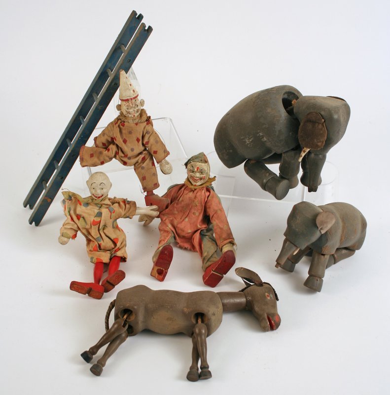 659) SIX SCHOENHUT CIRCUS TOYS,: including 6" x 9 1/2" elephant, a small elephant, a donkey, three clouds (one missing a leg), and a ladder