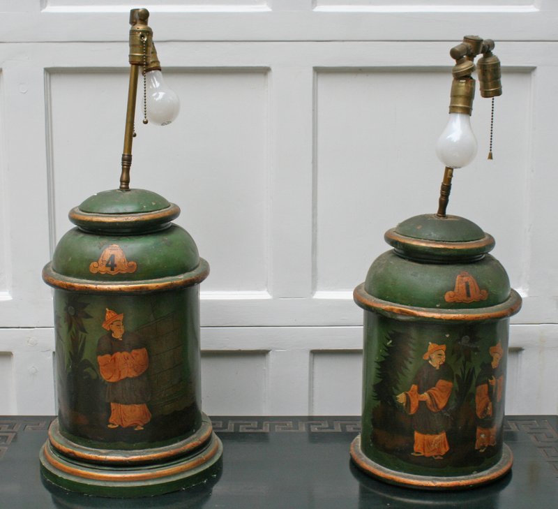 668) PAIR GREEN-PAINTED CHINESE TOLE TEA CANISTERS: mounted as lamps, H: 17 ½", lamp sockets loose, few dents, missing 1-applied foot