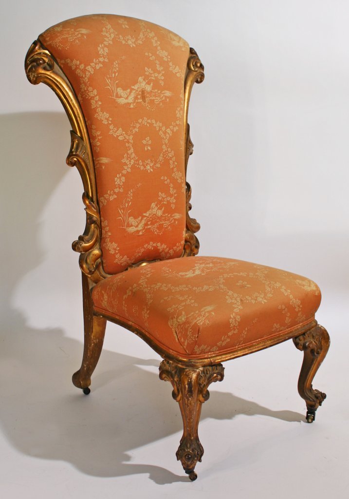 GILT CARVED ROCOCO SLIPPER CHAIR: on casters, H: 42" seat height: 16"