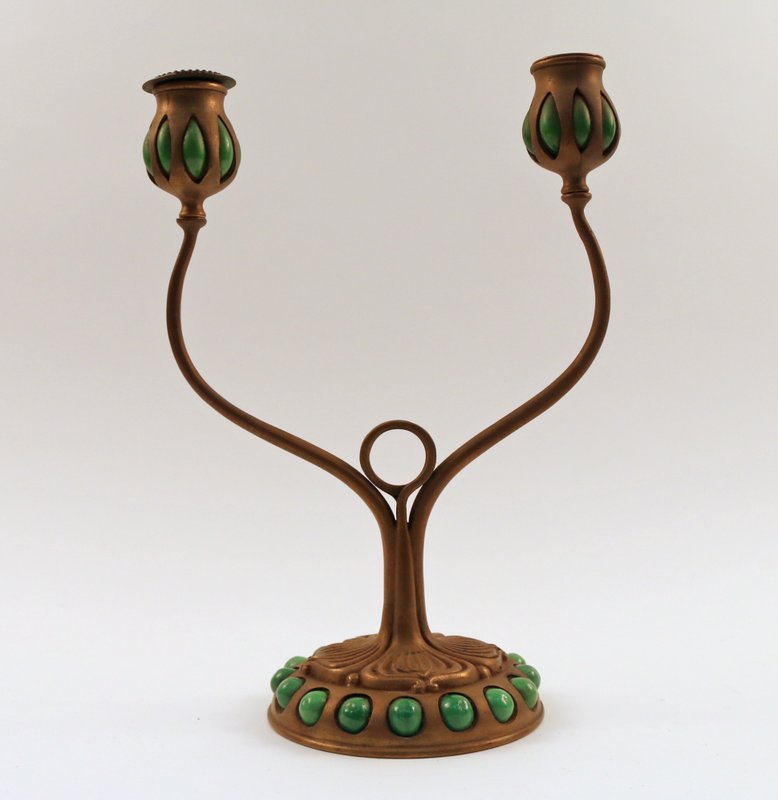 TIFFANY STUDIOS TWO LIGHT CANDELABRA,: bronze and inset favrille glass, missing bobeche, and with damage to one insert, H. 12 ½", stamped and numbered 885