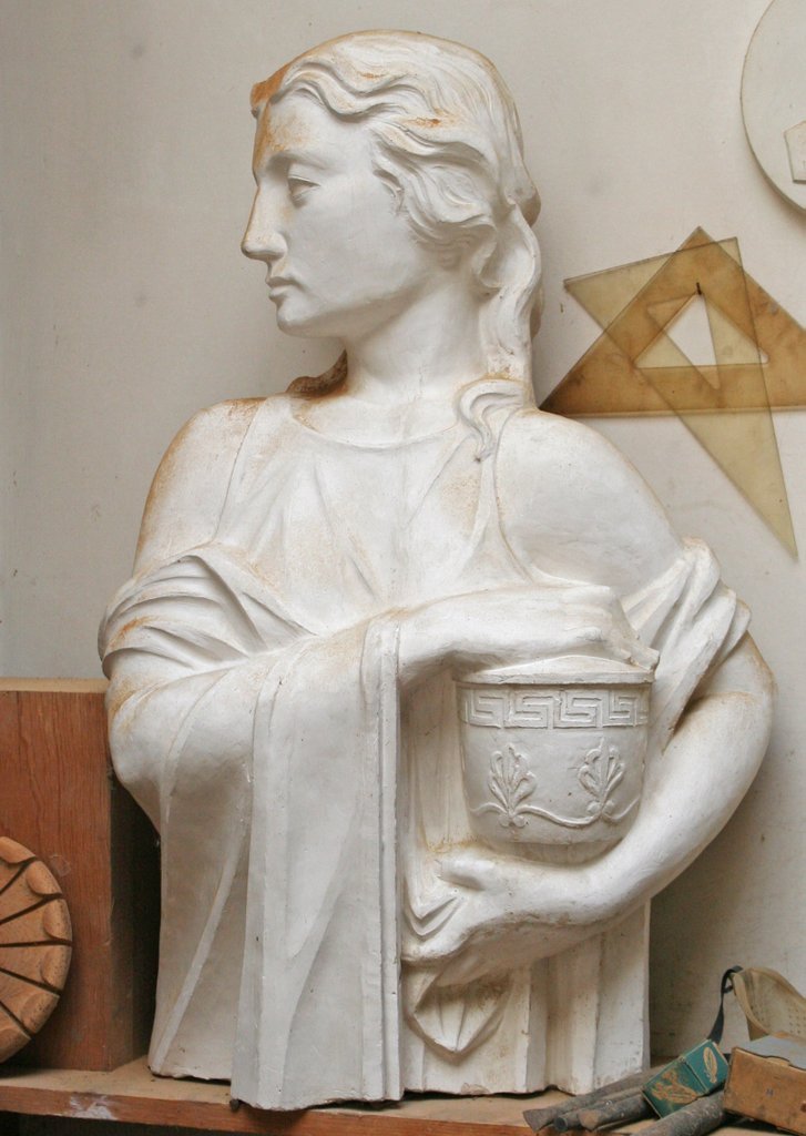 MICHAEL LUDWIG GRESSEL (American, 1902-2000),: Half portrait of Athena, carved plaster, H: 30"