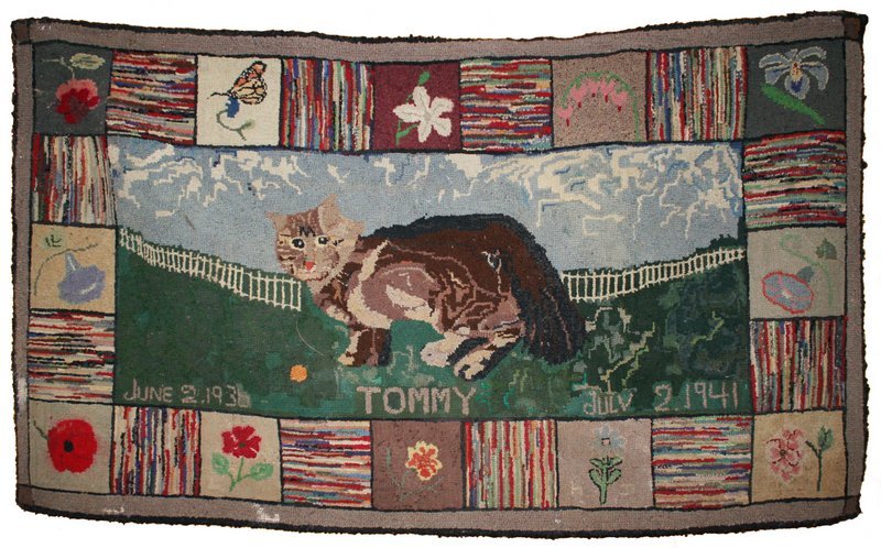 COMMEMORATIVE HOOKED RUG "TOMMY",: showing a Maine Coon, dated 1941, 34 1/2" x 60"