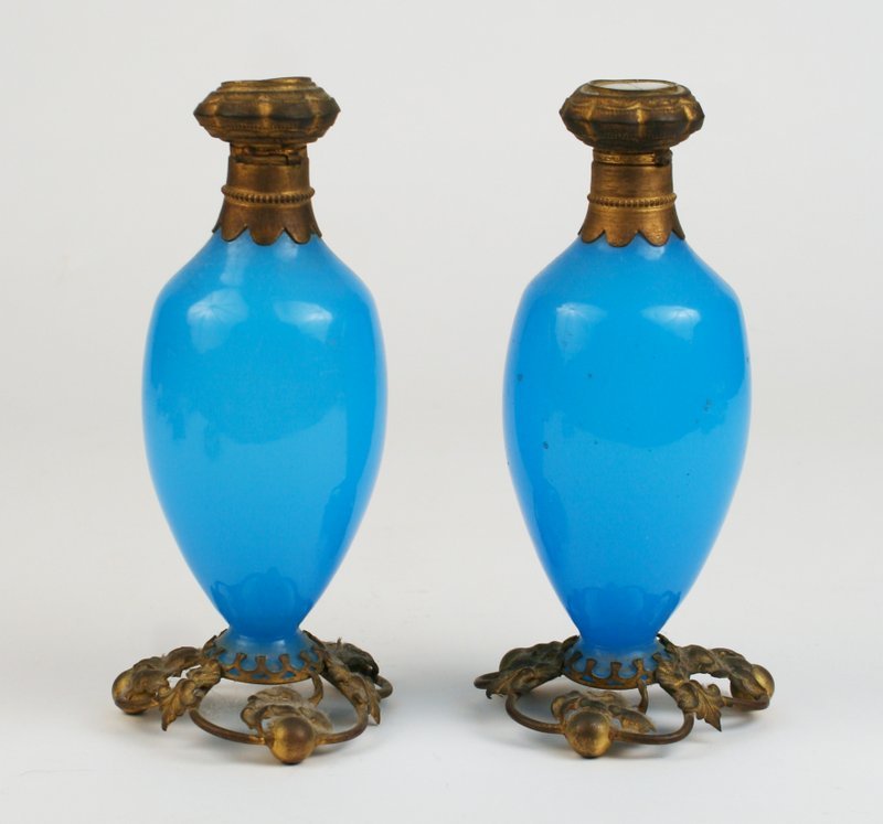 PAIR FRENCH OPALINE BLUE & ORMOLU PERFUME: BOTTLES, w/ormolu mounts, lid w/inset miniature ptgs., 1- w/dmgd clear glass covering other w/dmgd. Ptg., h. 7 ¼"