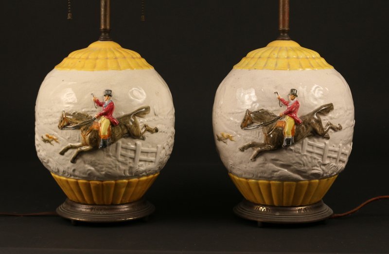 PAIR GLOBULAR GLAZED EARTHENWARE TABLE LAMPS: W/RAISED HORSE AND RIDER, H. 22" (TOTAL)