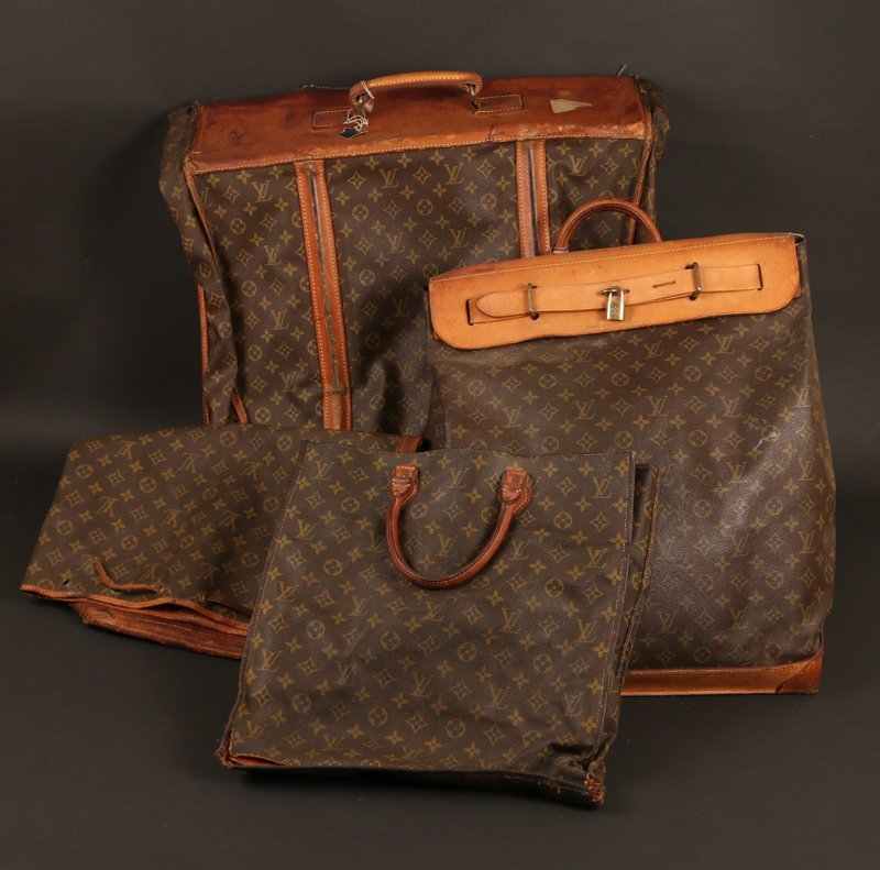 4 PCS. LOUIS VUITTON SOFT LUGGAGE,: including a garment bag, a shoe bag, a duffel bag, and a carry-on bag