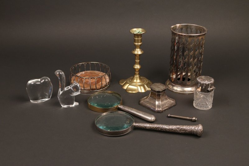 MISC. TABLE LOT,: including an early Georgian pedal base brass candlestick, h. 7 ½", an English silver inkwell (loaded), a sterling silver pipe taper, Baccarat squirrel and elephant, 2 magnifying glasses with silver h