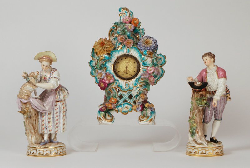 (3pc) CONTINENTAL PORCELAIN: including a Meissen figurine of a young man holding a hat (shepherd), a Meissen figurine of a young shepherdess, h. 7"; and a Dresdan boudoir clock, h. 8 1/2"