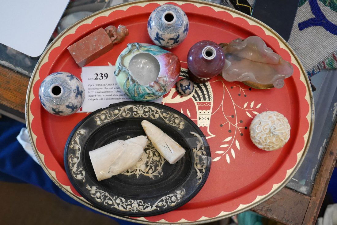 (7pc) CHINESE OBJET D'ART: Including two blue and white mini covered crackle-glaze jars, h. 3”; a red soapstone (?) chop; a mini sang-de-beouf baluster shaped vase; a carved white jade brush washer (cracked and chipped) with