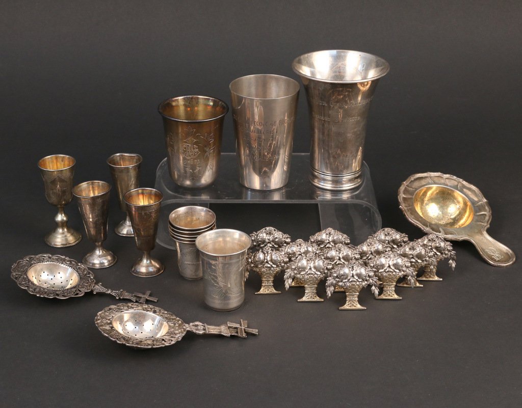 (28pc) RUSSIAN AND CONTINENTAL SILVER: Incl. four footed Russian kiddish cups; five nesting Russian kiddish cups; two larger russian kiddish cups; two graduated beakers; three tea strainers; and a set of twelve place-card holders each in t