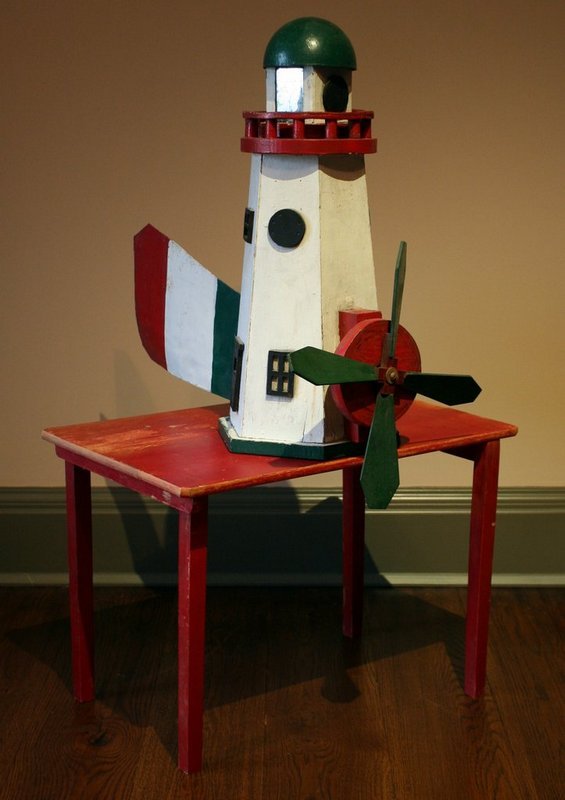LIGHTHOUSE WHIRLI-GIG ON STAND: Height of whirli-gig: 24" Height of stand: 17"