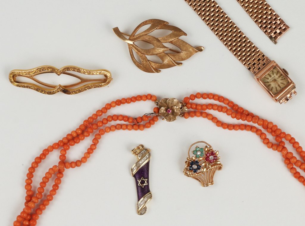(6pc) LADY'S GOLD & CORAL JEWELRY: Including: a 14k pink gold wristwatch, dmgd. & repaired band, tot. wgt. 23 gms (without movement & crystal); three 14kyg pins; a 14kyg pendant; plus a coral necklace with a 14kyg clasp; tot. weighable