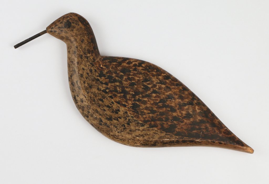 ANTIQUE SHOREBIRD FLATTIE: in original paint with nail bill, painted eyes, 10 1/2" long; Provenance: estate of the late Barbara Adrian