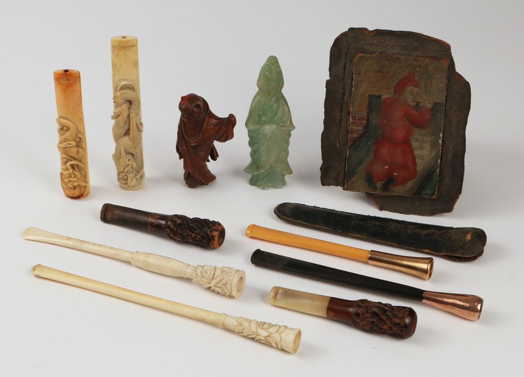 (11pc) MISC. LOT: 8-CIGARETTE HOLDERS: (2-antique with carved sinuous dragons); a very fine antique netsuke of cat wearing a robe (ear with dmg.), h. 2 3/4"; a greenstone carving of Quanyin (repair at neck and chipped feet); plus a miniatu