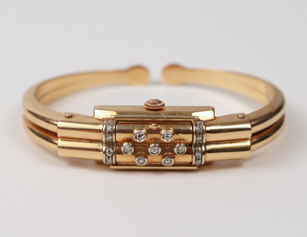 18KYG INVICTA WATCH HARD BRACELET: with melee diamonds, mkd. "750", approx. wgt. 20 gms. (without movement)