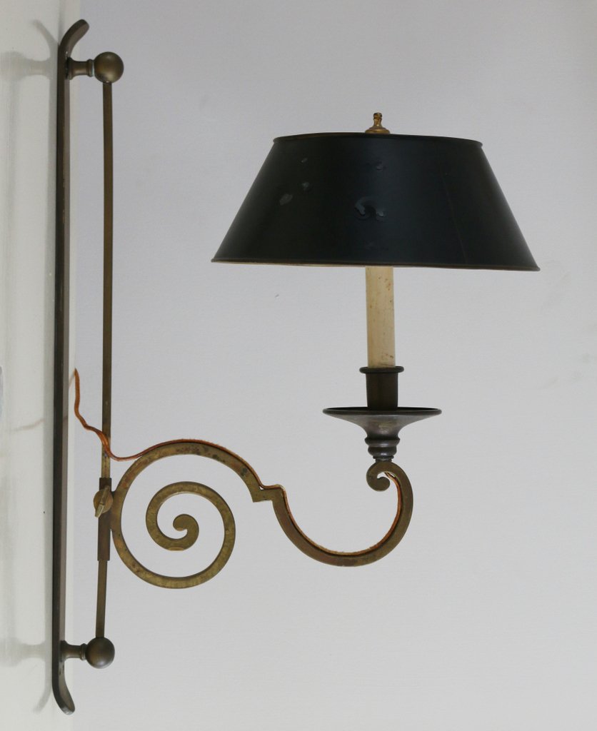 PAIR BRASS SINGLE ARM WALL SCONCES: 20th Century, adjustable, the arms of an S-scroll shape with tole shades.