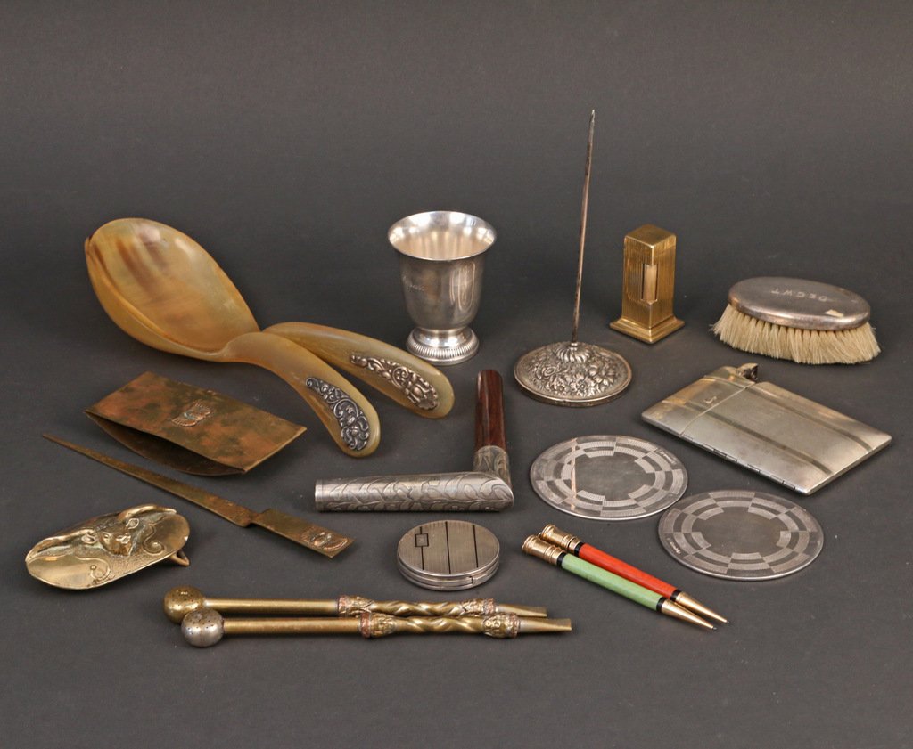 (18pc) SILVER AND OTHER TABLE ACCESSORIES: Incl. two 10-1/2" horn servers; a Christophle brandy cup; a cane handle; a Tiffany round enameled compact; an Elgin sterling silver cigarette case and lighter, 5"; two Christophle coasters; a sterling