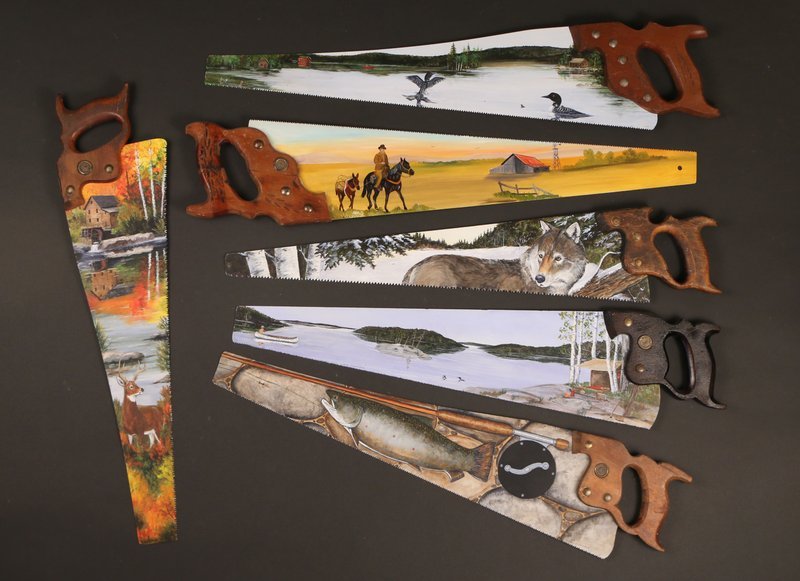 SIX FOLK-ART PAINTED SAWS,: 20th Century, hard edge, with depictions of realistic sporting scenes, most by Sue Emerson