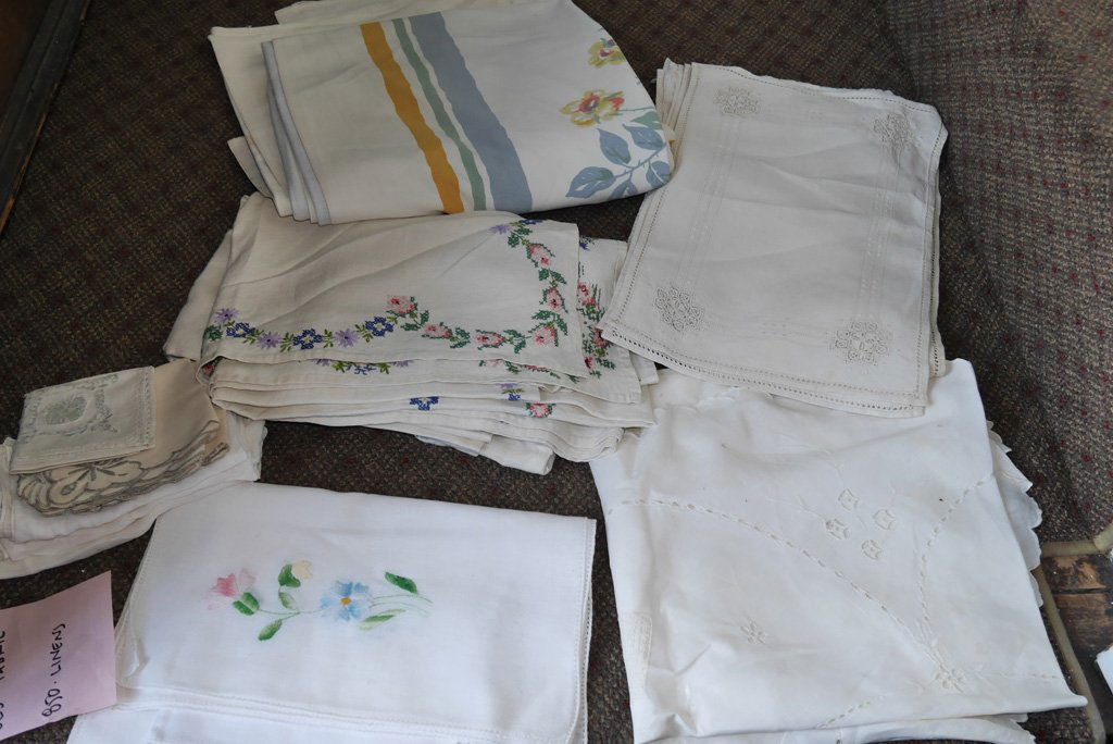 GROUP OF TABLE LINENS: IN PLASTIC SHEELVE