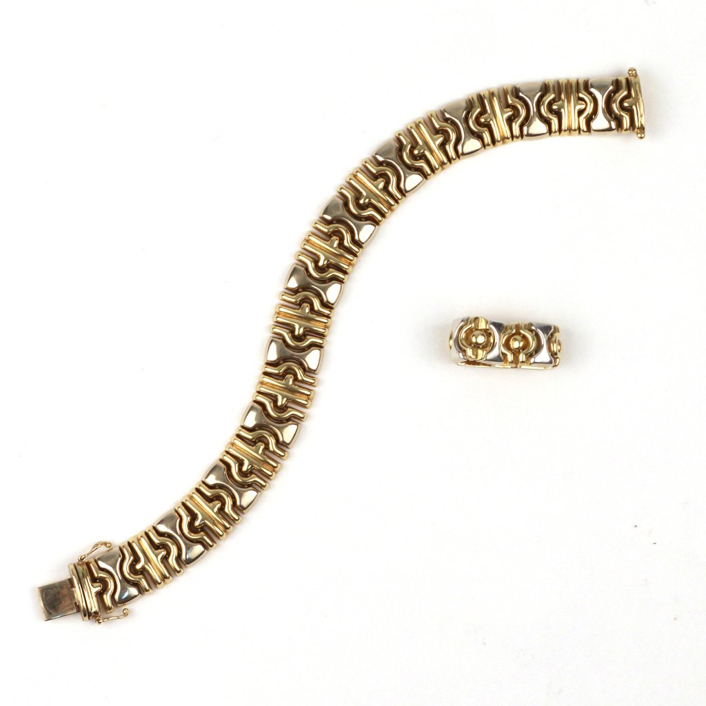 (2pc) 18k TWO-COLOR GOLD 'PARENTESI' BRACELET: AND RING, both marked '18k Italy', the ring by Roberto Coin, with the maker's mark '1226 vi', 7 in. (the bracelet), the ring size 6, tot. wgt. 48 gms.