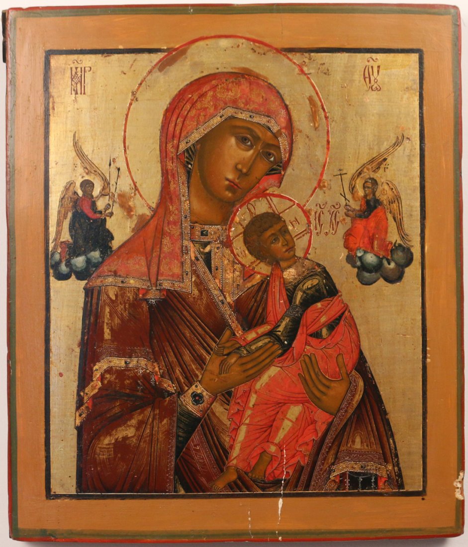 RUSSIAN ICON: 19th Century, of the Mother and Child with attendant angels, tempera on board, with a gilt reserve on an ochre ground, 12 3/4 x 11 x 1 1/4"