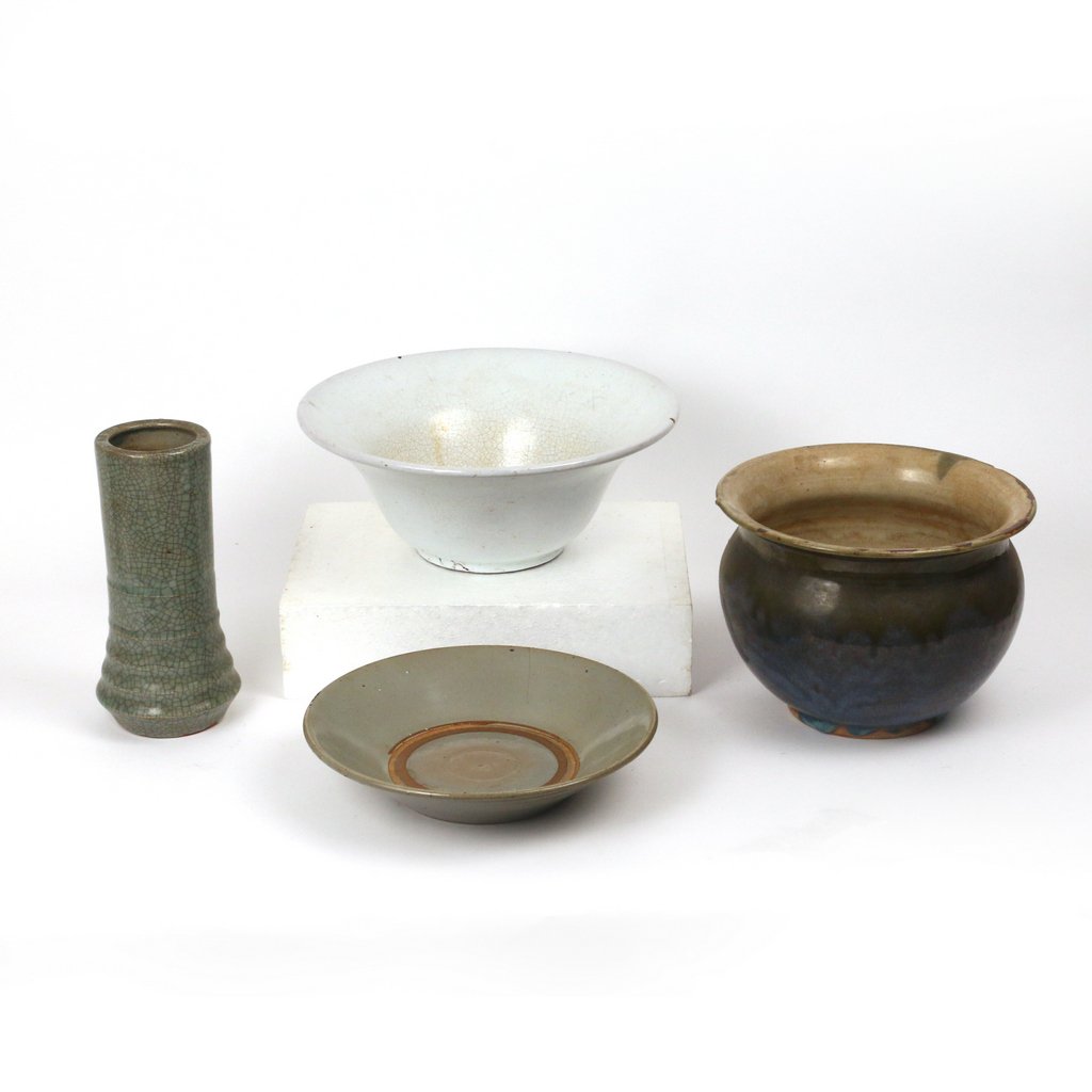 (4pc) ASIAN GLAZED EARTHENWARE: Including a white-glazed bowl with a flaring rim and crackled center, h. 4 ½ d. 11 ½ in.; a grey-glazed dish with an unglazed ring at the center, d. 9 in., with 1 ¾ in. hairline; a bamboo-shaped va