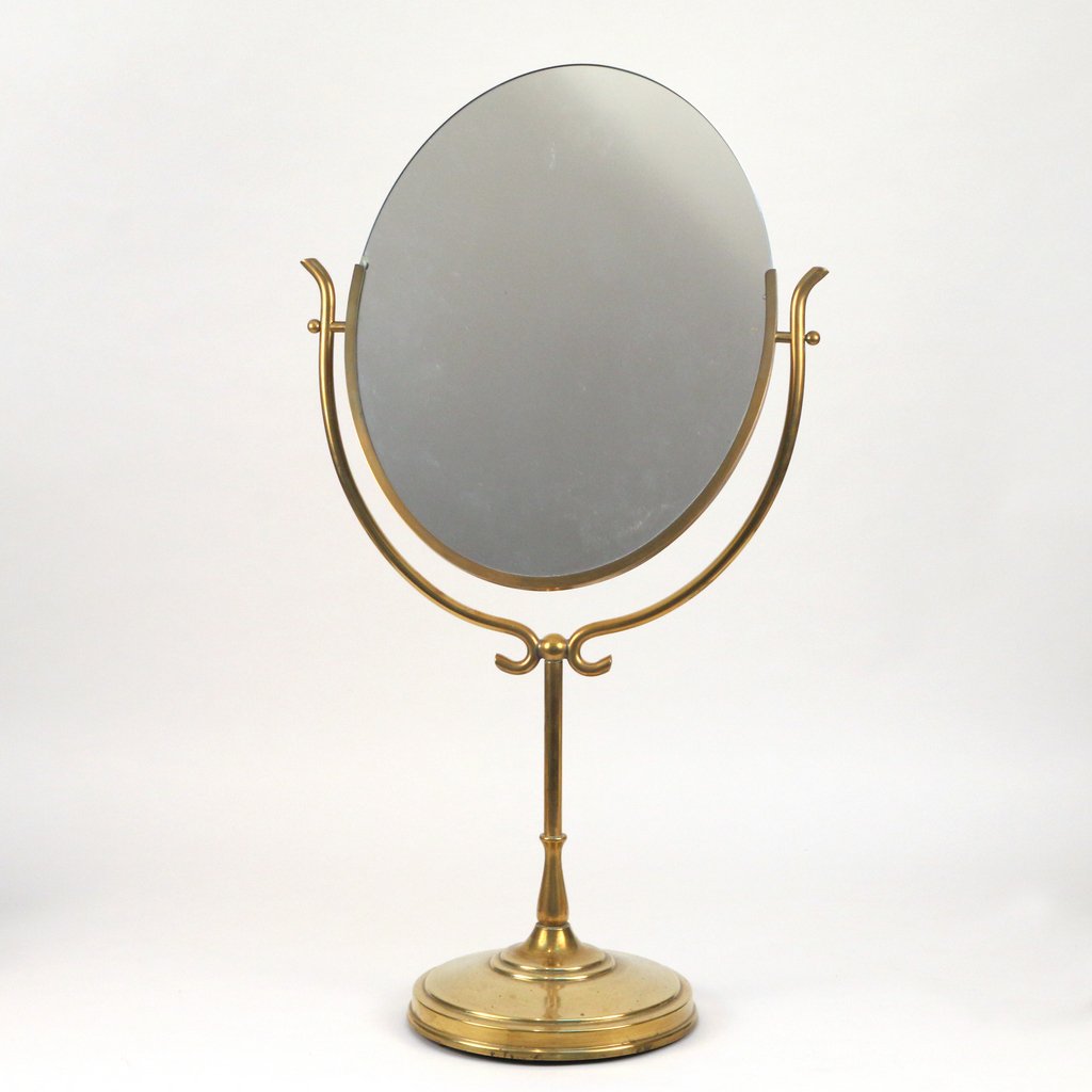 BRASS TABLETOP DRESSING MIRROR: h. 33 in., w. 18 in.