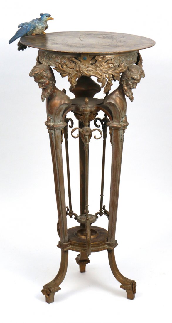 AESTHETIC PERIOD ORMOLU AND COLD PAINTED TORCHIERE: Constructed of various metals and having monopodia form legs, and possible w/ added metal top with a decorative enameled bird; h. 35, dia. 16 in.